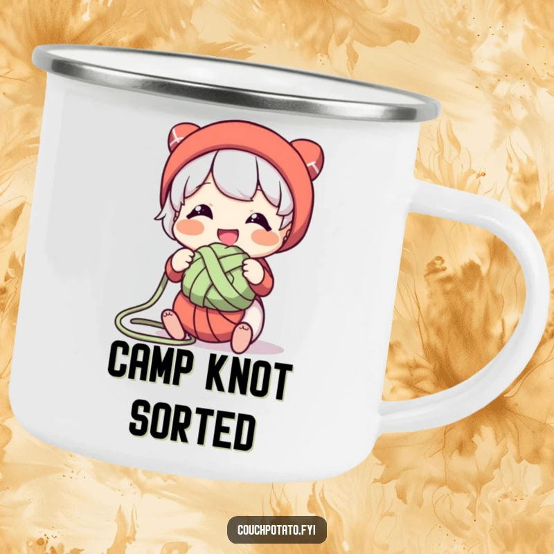 Funny, durable camping mug showing a character smiling while untangling a knot of yarn, perfect for outdoor crafting enthusiasts.