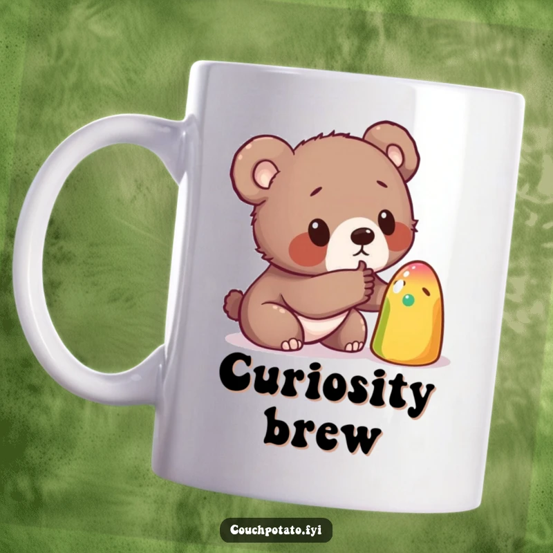 Funny mug showing a curious bear cub cautiously poking a strange, brightly colored object with its paw, embodying playful exploration.