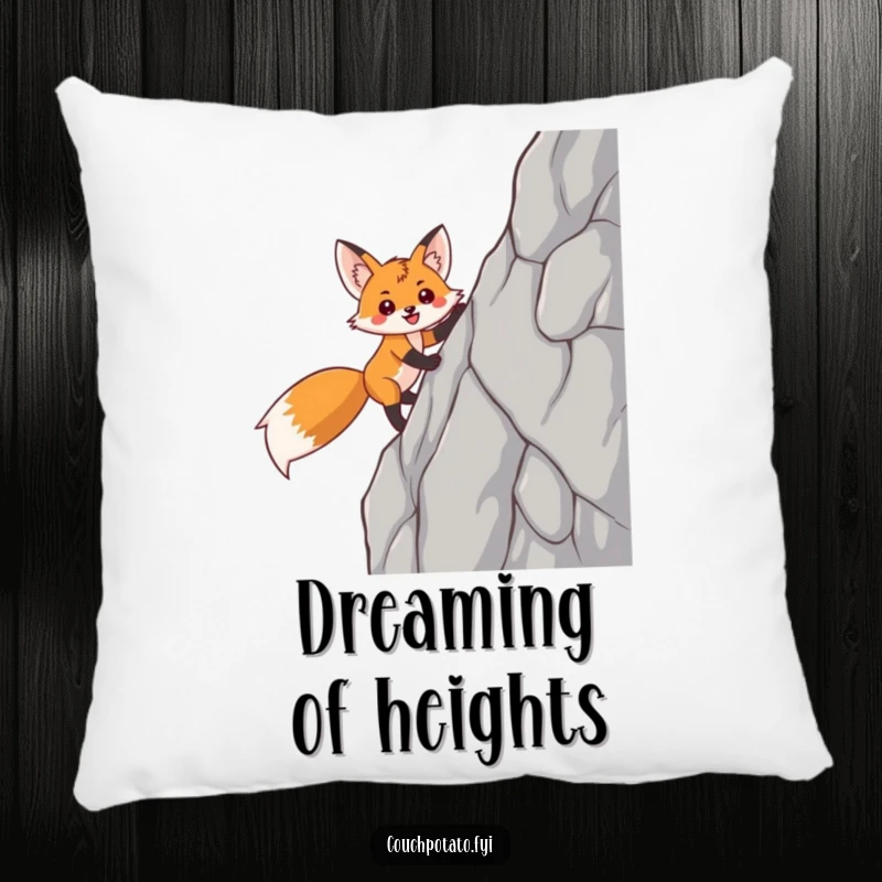 Funny fox pillow with a smiling, triumphant fox character scaling a steep rock face, providing comfortable encouragement.