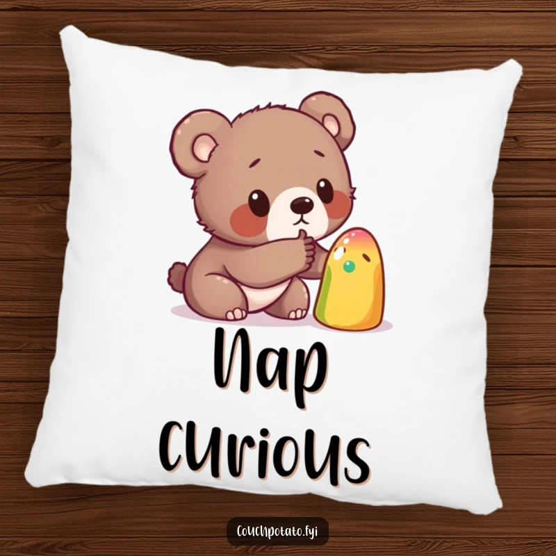 Funny pillow featuring a curious bear cub poking a strange, colorful object, bringing a touch of playful exploration and comfort to any room.