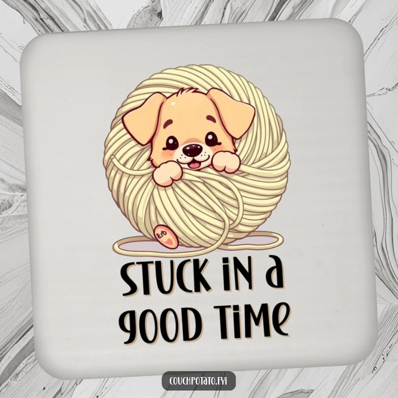 Funny puppy comically tangled in a giant ball of yarn, presented on a coaster, providing a humorous and practical surface protection.