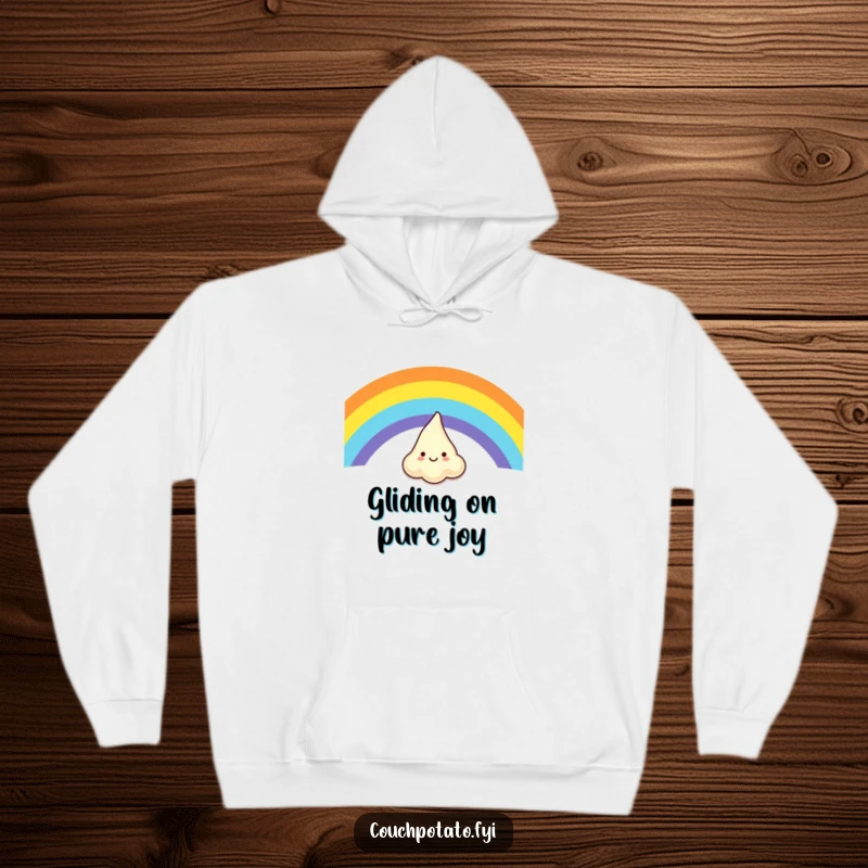 Funny hoodie with a laughing cream cheese dollop in mid-air, sliding down a bright rainbow, perfect for cozy, humorous days.