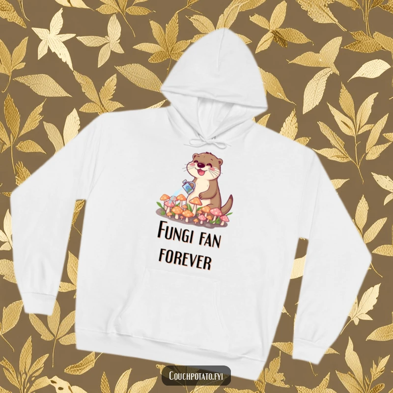 Funny hoodie displaying a cheerful otter with a watering can tending to a patch of bright, tiny mushrooms in a forest scene.