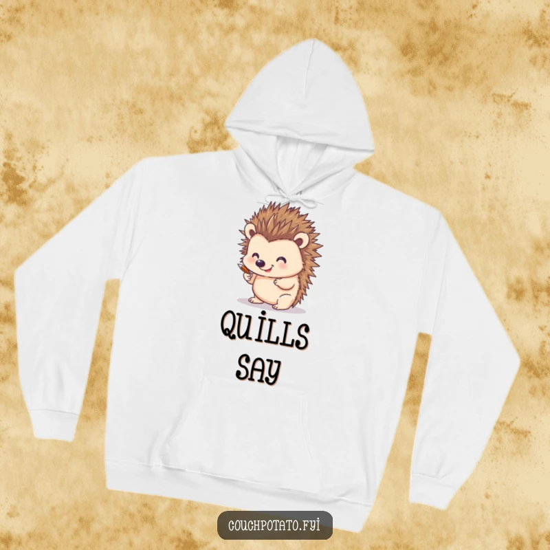 Funny hoodie depicting a happy hedgehog using its sharp quills as art supplies, drawing with focus and a smile, perfect for cozy creative sessions.