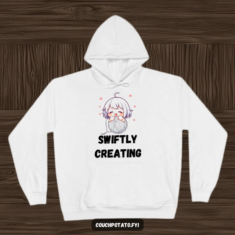 Funny hoodie design depicting a character happily and swiftly winding yarn into a neat ball, symbolizing organized crafting.
