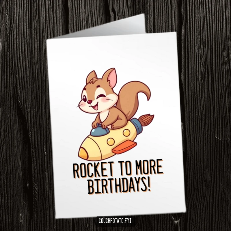 Funny Free Printable Birthday Card: A fearless squirrel grinning wildly while riding a small rocket ship through the sky.