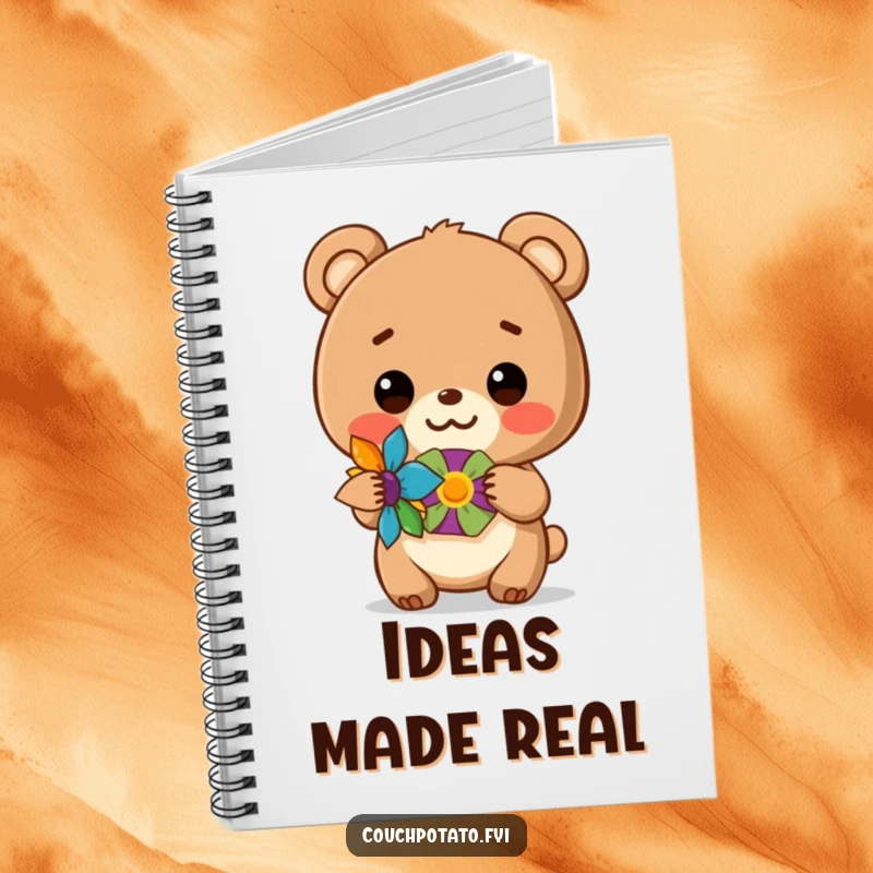 Funny notebook cover with a bear cub proudly displaying a finished craft, perfect for creative notes.