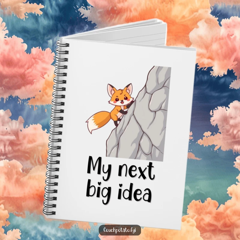 Funny fox notebook with a smiling, triumphant fox scaling a sheer rock face, inspiring goal setting and notes.