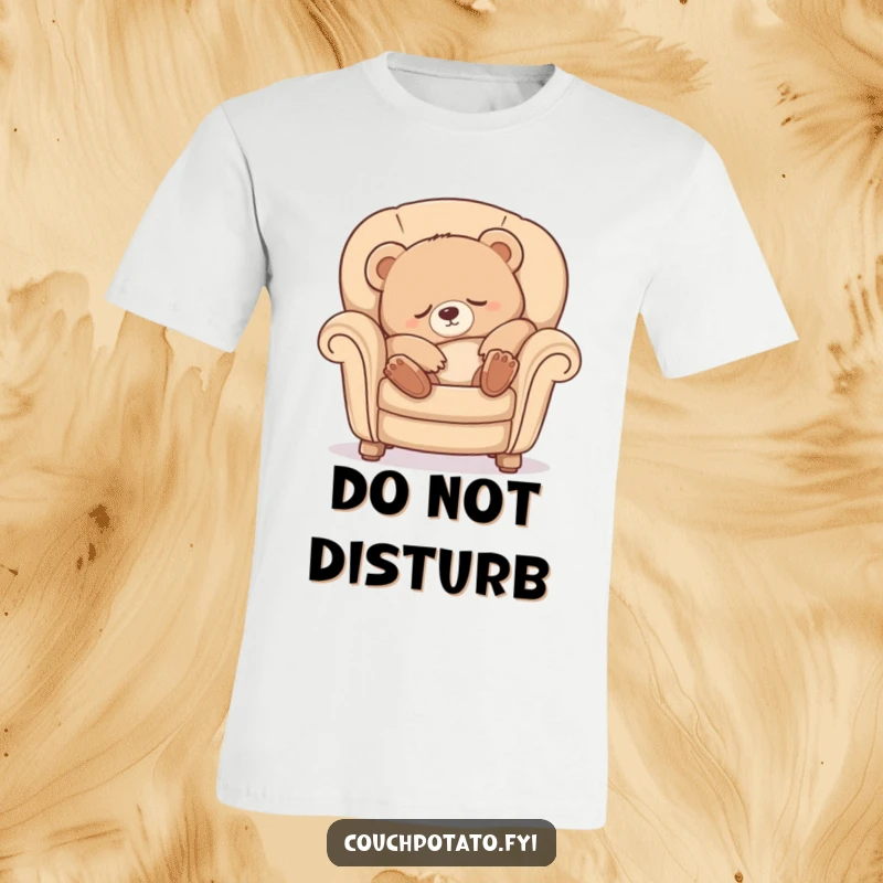 Funny Sleepy Bear T-Shirt depicting a cute bear cub doing a luxurious stretch while sinking into a comfy armchair, promoting relaxation.