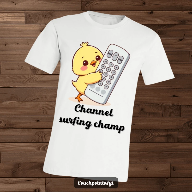 Funny cute chick character adorably attempting to hug an oversized television remote control on a soft t-shirt.