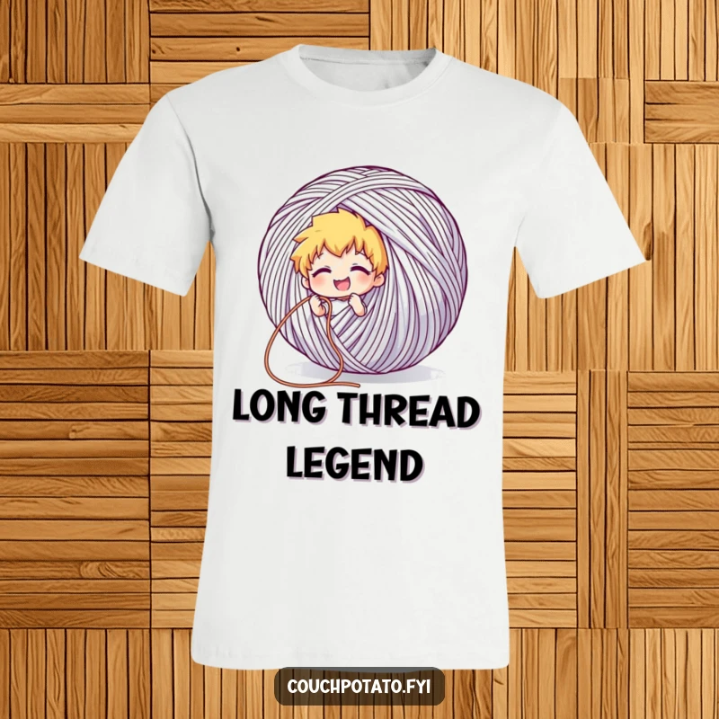 Funny t-shirt graphic of a character grinning while pulling a long thread from a giant yarn ball, representing ambitious crafting.