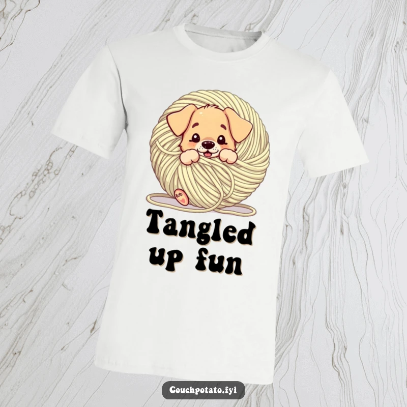 Funny puppy comically entangled in a large ball of yarn, printed on a tee, showcasing a humorous and chaotic playtime.